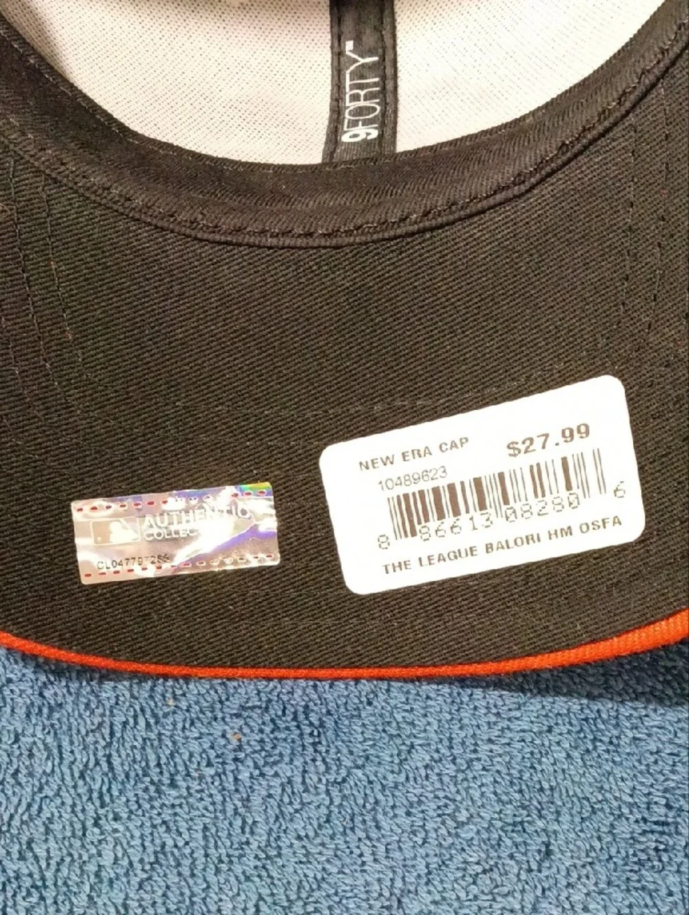 New Era Orioles 9FORTY Cap in White, Black, Orange